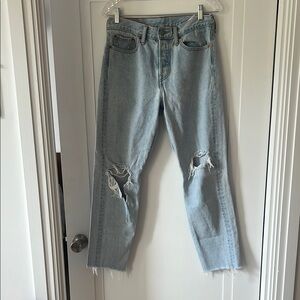 Levi's Light Wash Straight Leg Jeans with Distressed Details